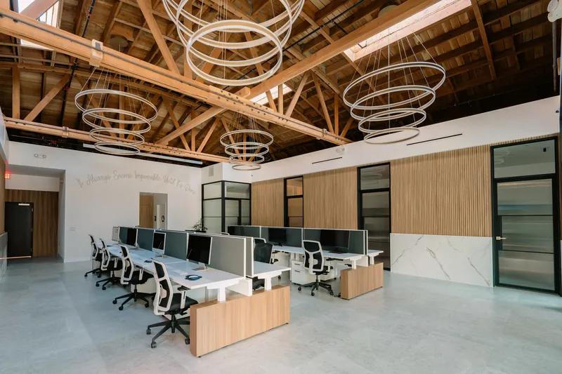 Angled view of sit-stand benching rows, Los Angeles