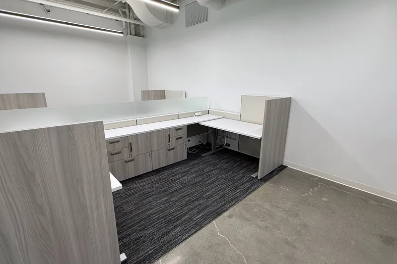 Sit-stand workstation pod in an enclosed room, El Segundo