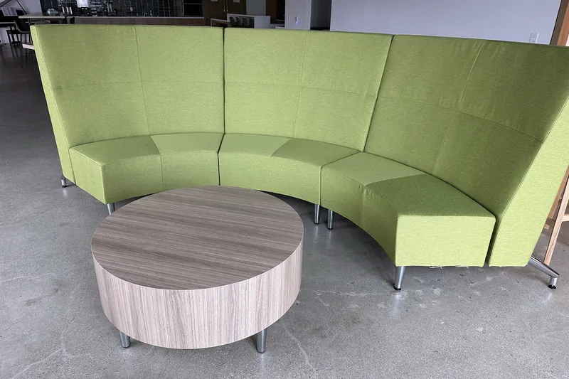 Green high-back curved booth with round table, software company, Glendale