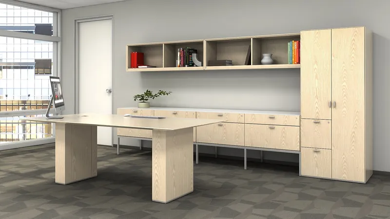 Private office with a light wood table desk, open overhead shelving, lateral files and a wardrobe cabinet, manufacturer photo